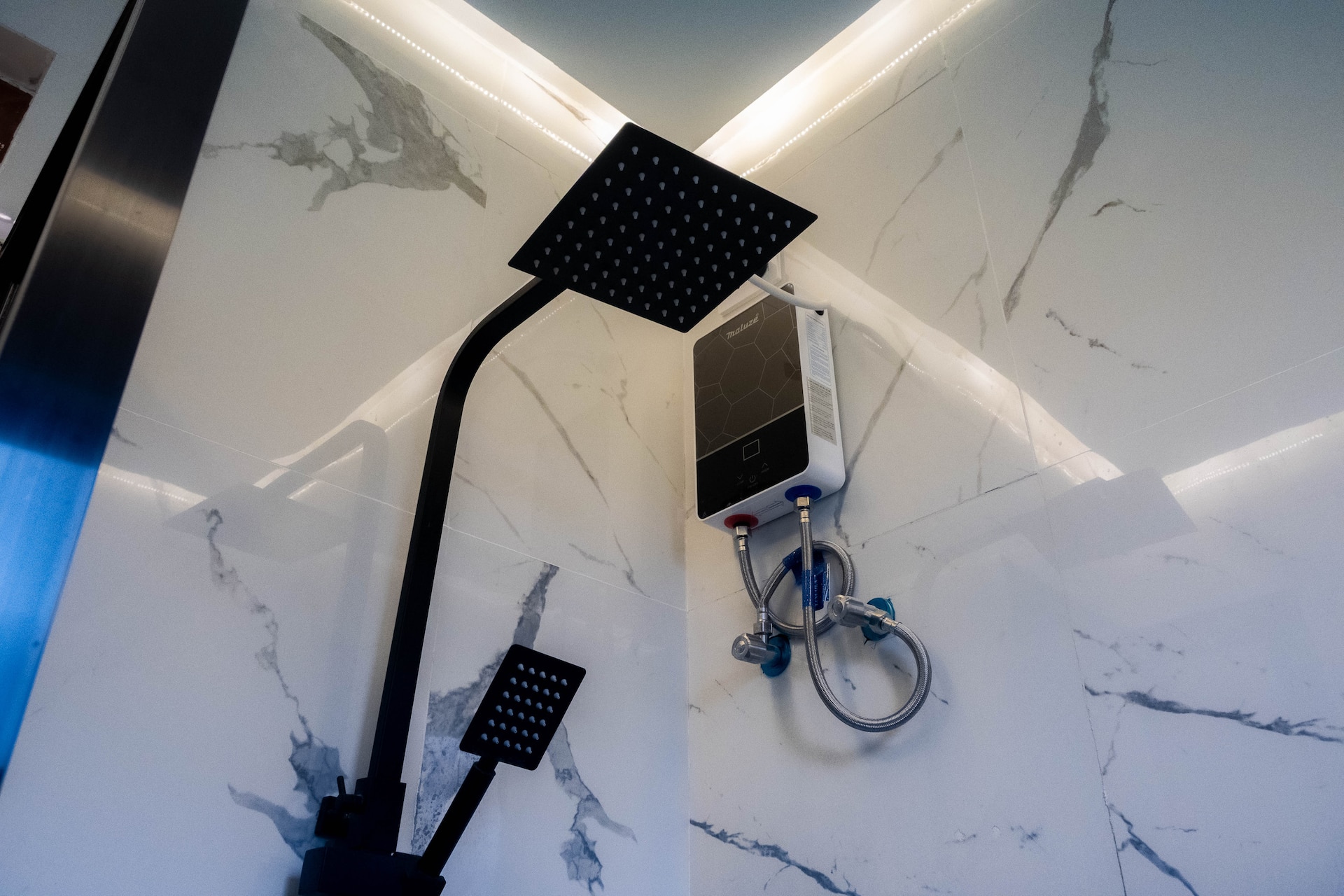 Matte Black Rainfall Shower Head, Wand & Digital Water Heater on Marble Tile
