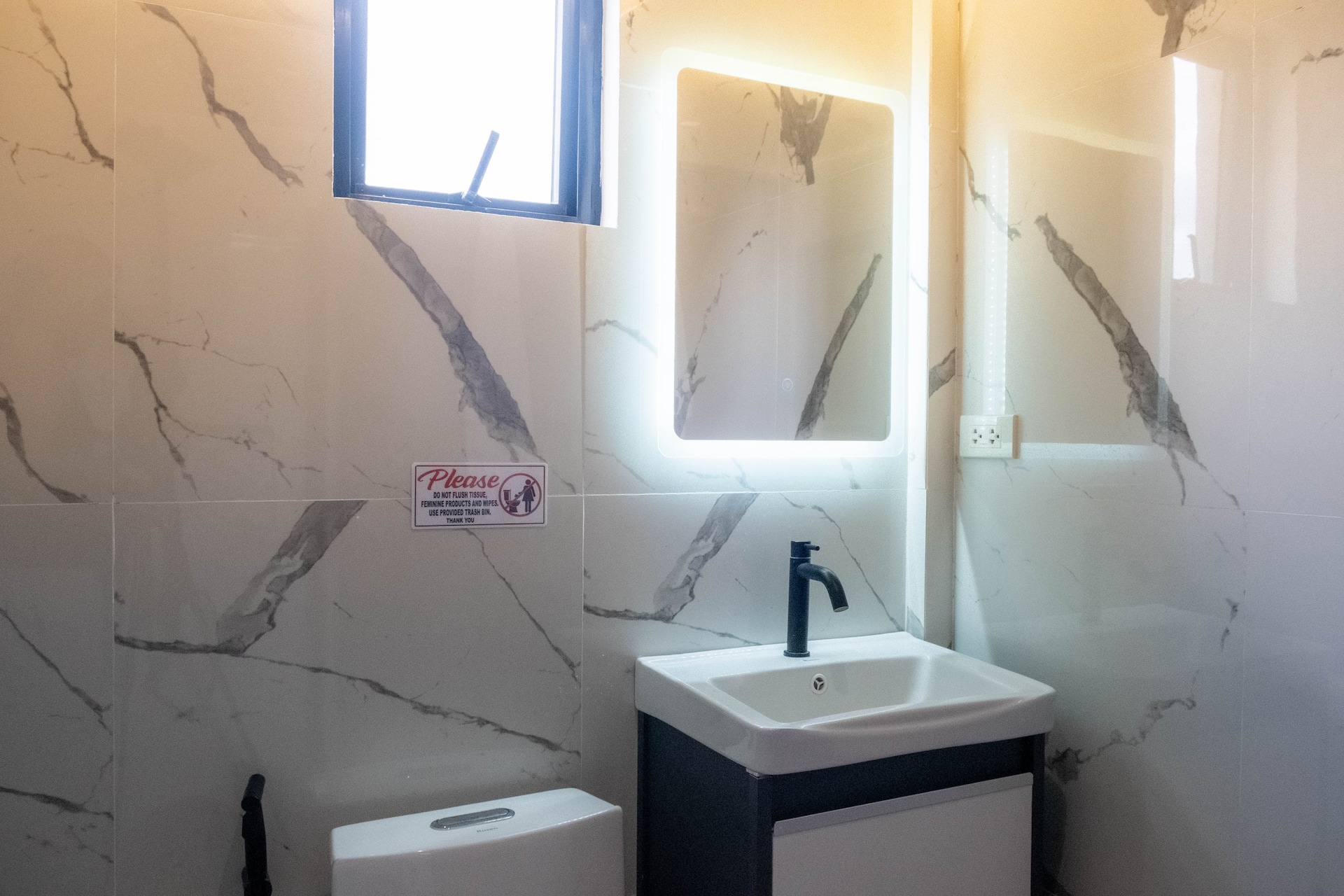 Modern Ensuite Vanity Sink with Matte Black Faucet & LED Backlit Mirror
