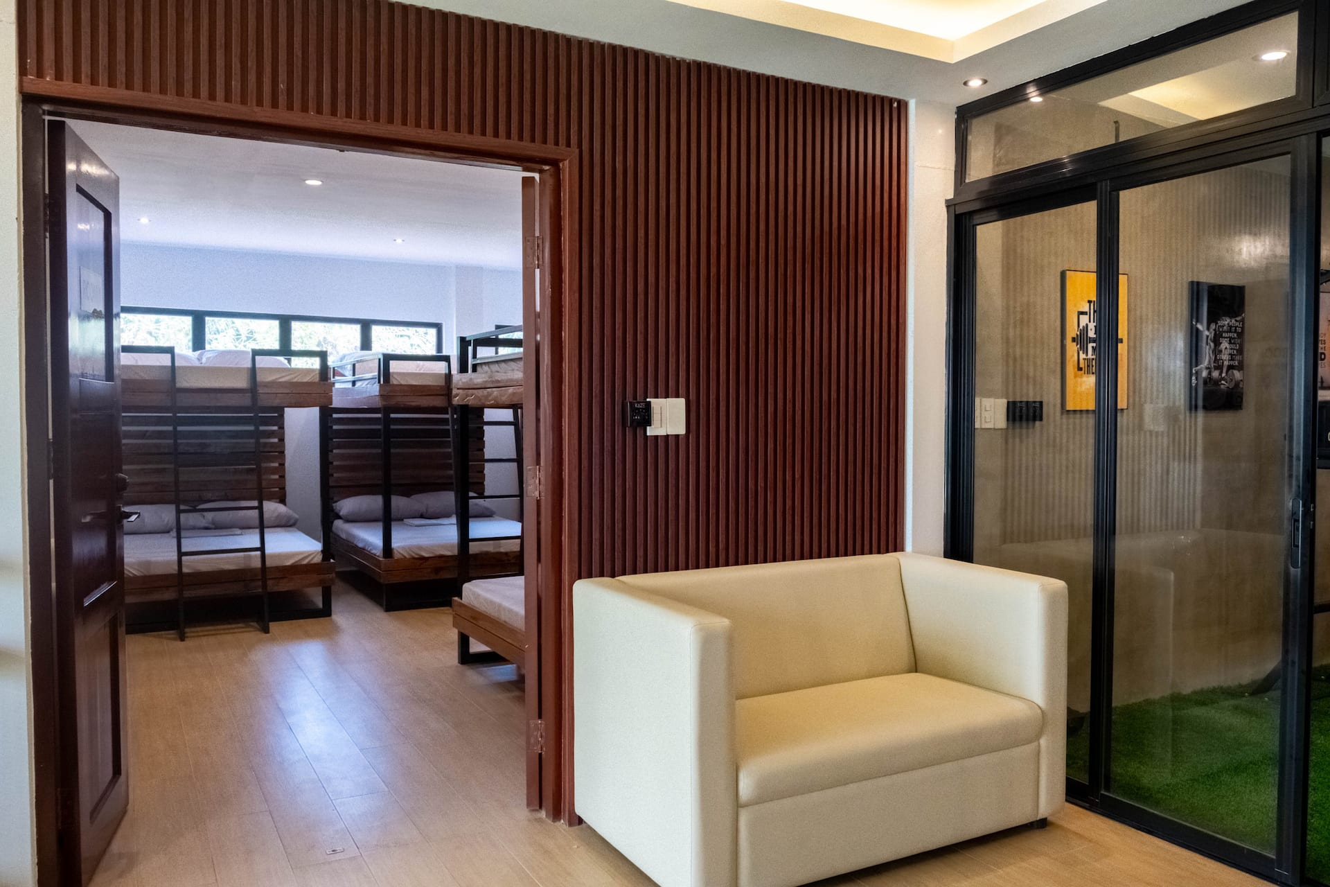 Bunk Bedroom Ante-Room with Fluted Slats & Glass Sliding Door to Gym