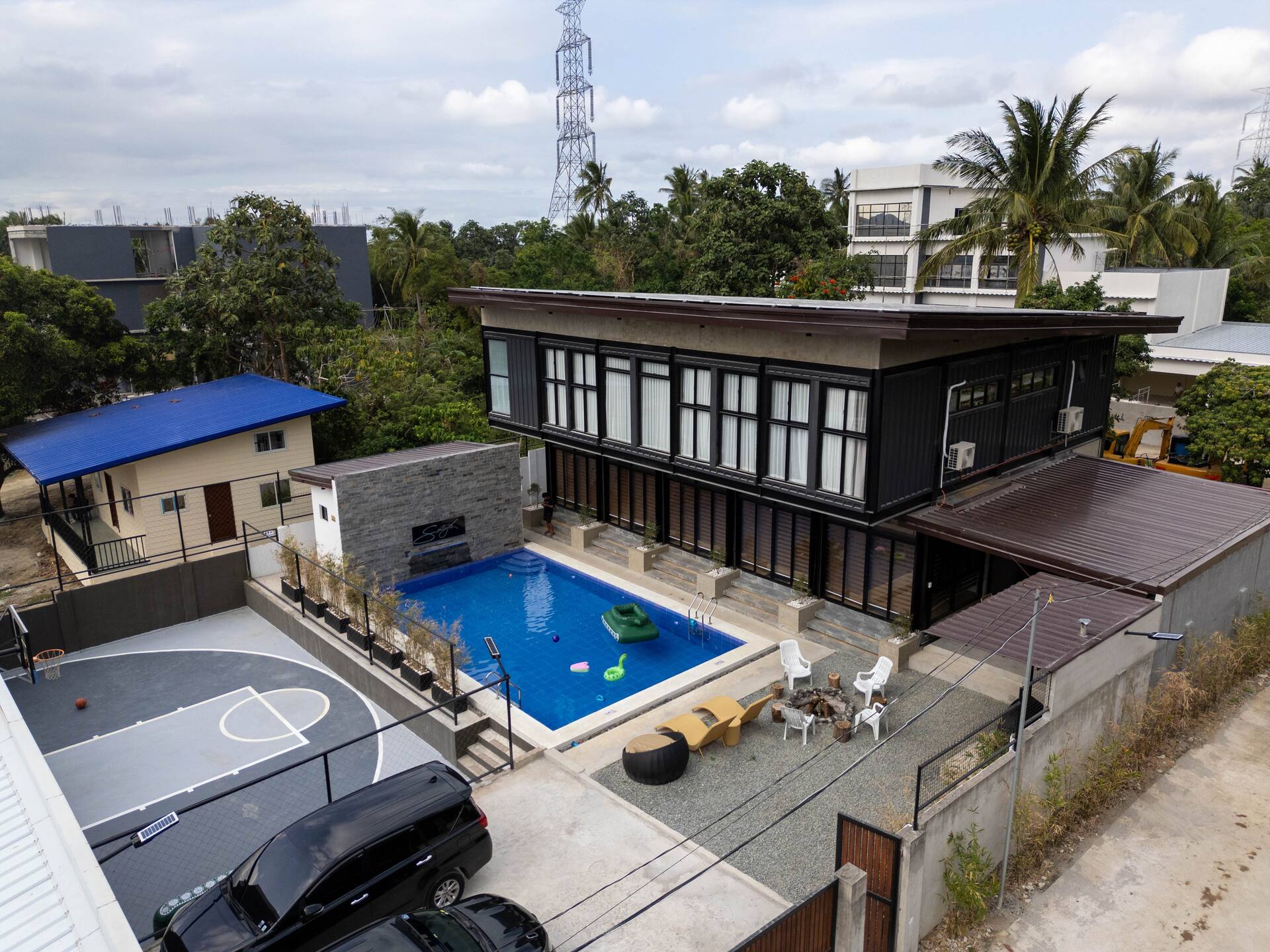 Daytime Aerial Drone View of Villa, Pool & Basketball Court