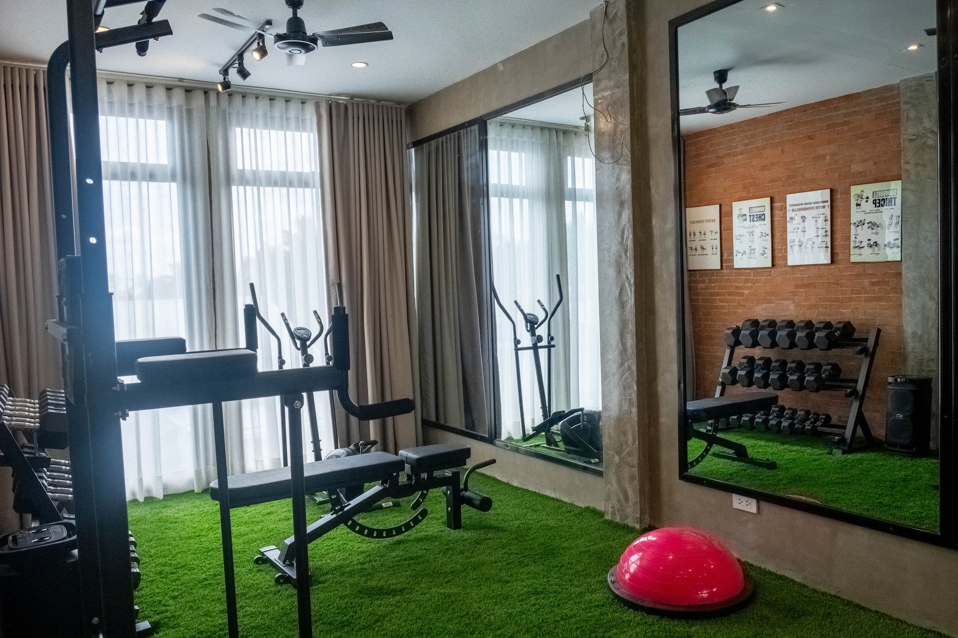 Indoor Fitness Gym with Turf Flooring, Dip Station & Mirror Wall
