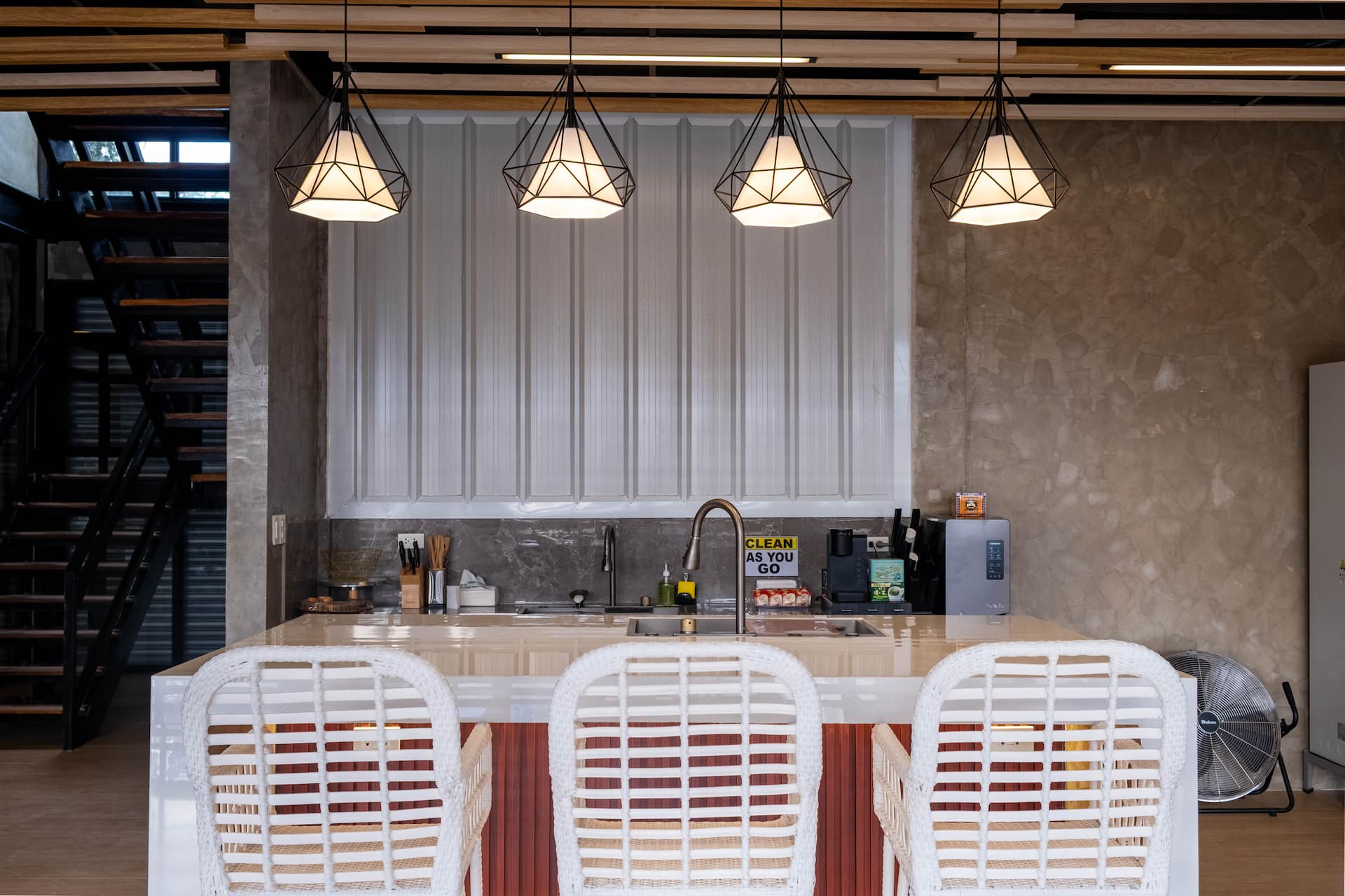 Symmetrical Front View of Kitchen Island Breakfast Bar & Pendant Lights