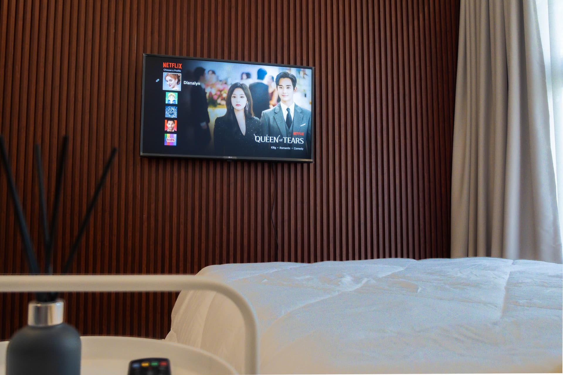 VIP Bedroom Suite Smart TV on Fluted Wall with Bed Duvet View